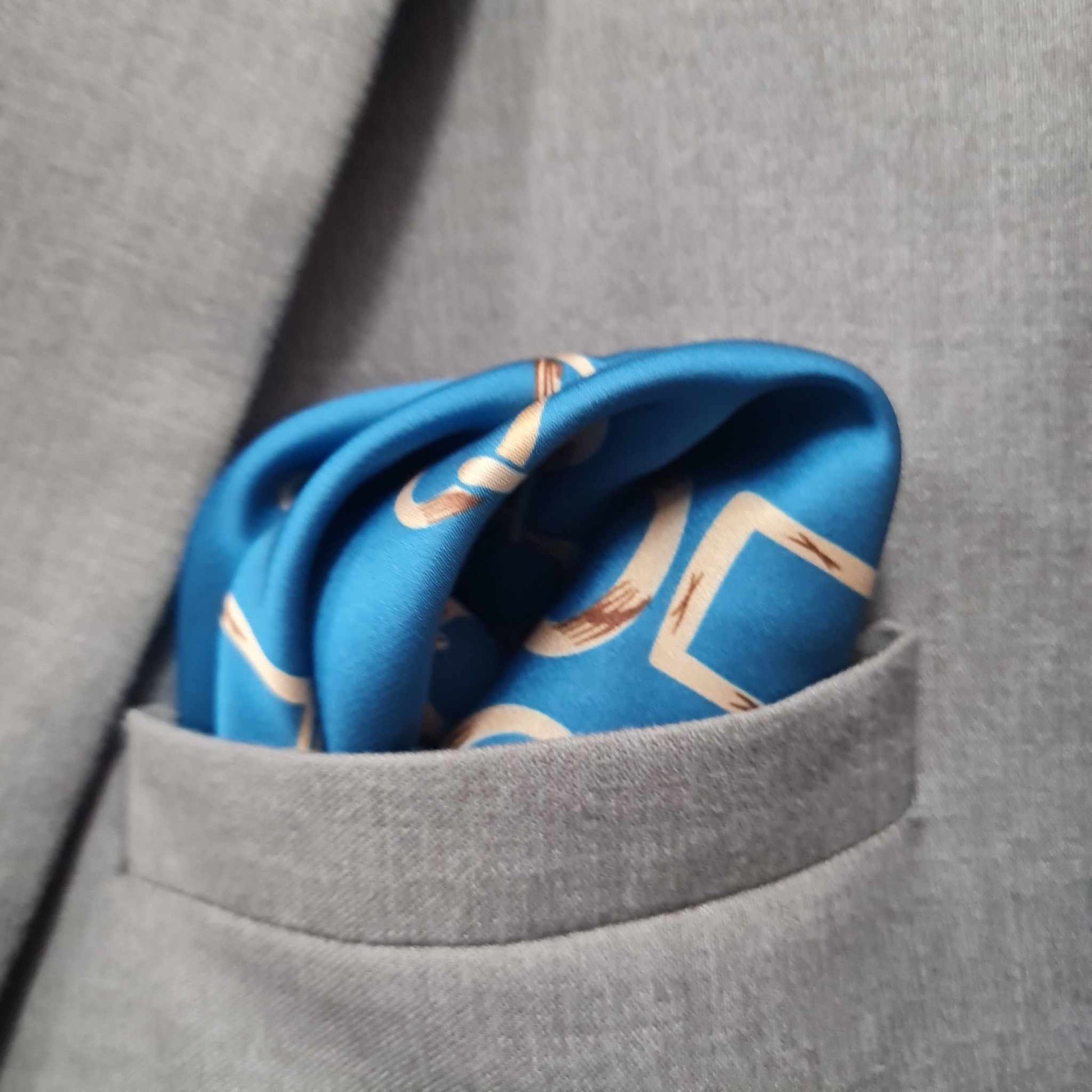 13 by 13 inches Light Blue Base with Golden Brown Chain Pattern Pocket Square