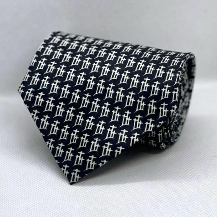 Black with repeating white cross pattern Polyester Broad Tie