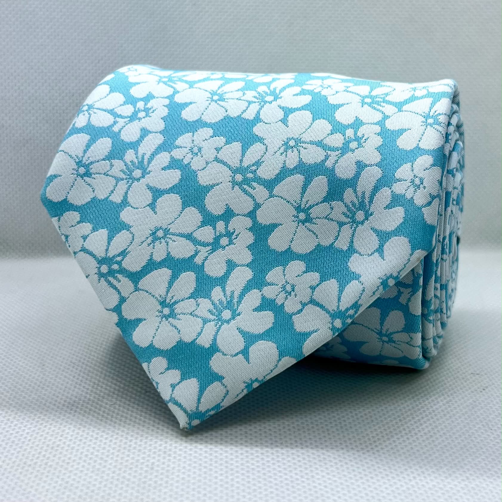 Sky Blue Base with White Floral Polyester Tie