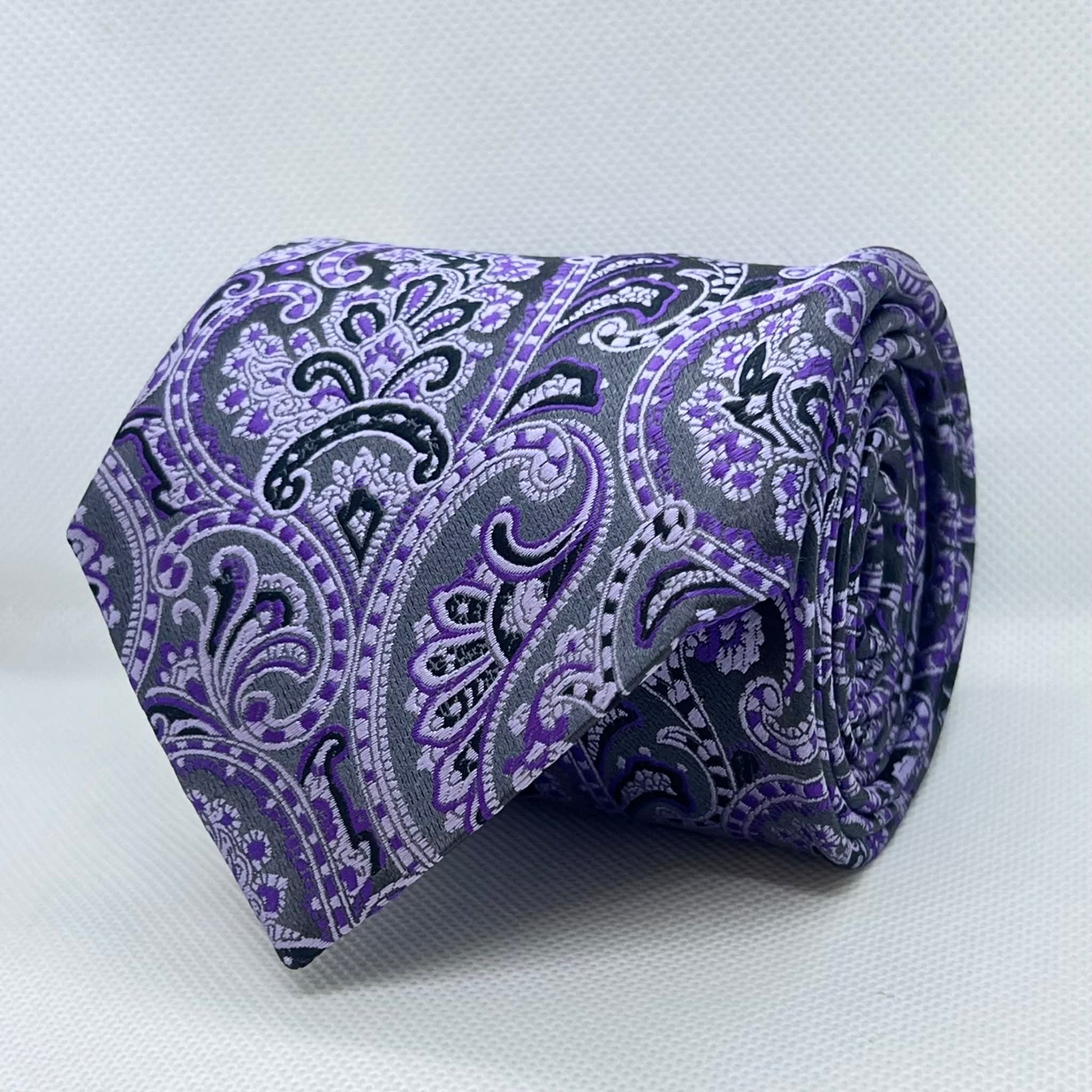 74% Polyester 28% Silk Royal Purple Paisley Tie