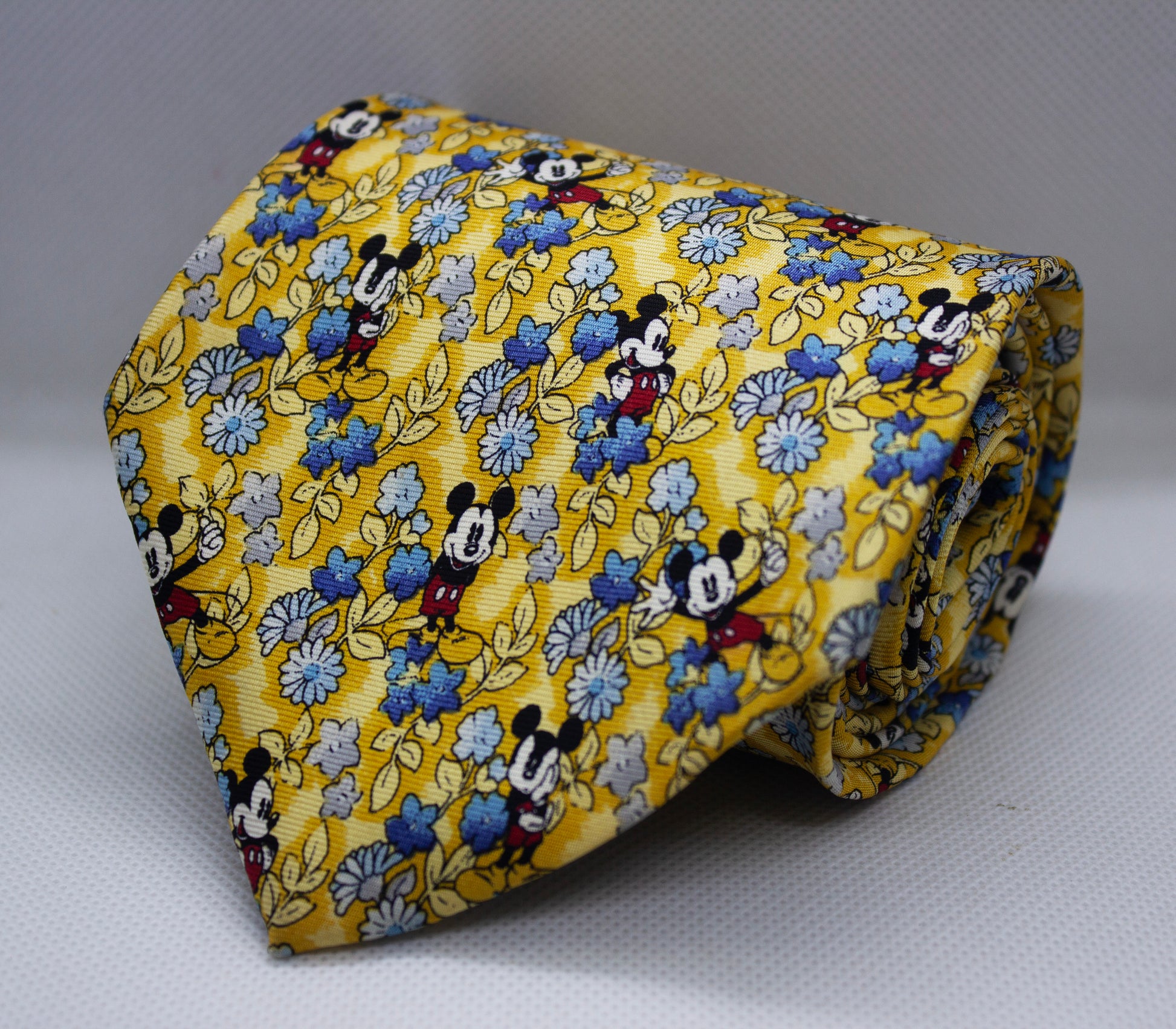 Golden Silk Broad Tie with Playful Floral & Character Motifs